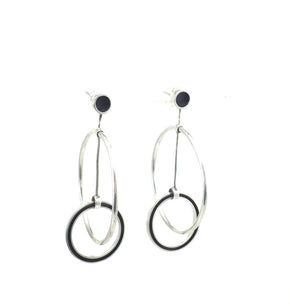 Sterling silver Orbital Hoops are meant to move you with two tube hinges on the upper and lower hoops. The tube hinges provide movement forward and back and side to side. 